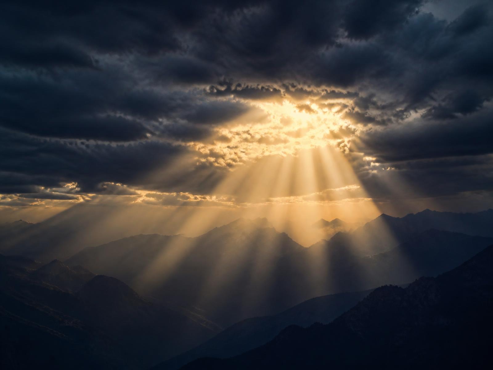 Light breaking through clouds